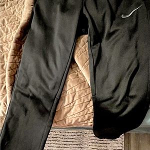 Nike black dri fit workout pants. Very comfy, micro fleece interior. Xl